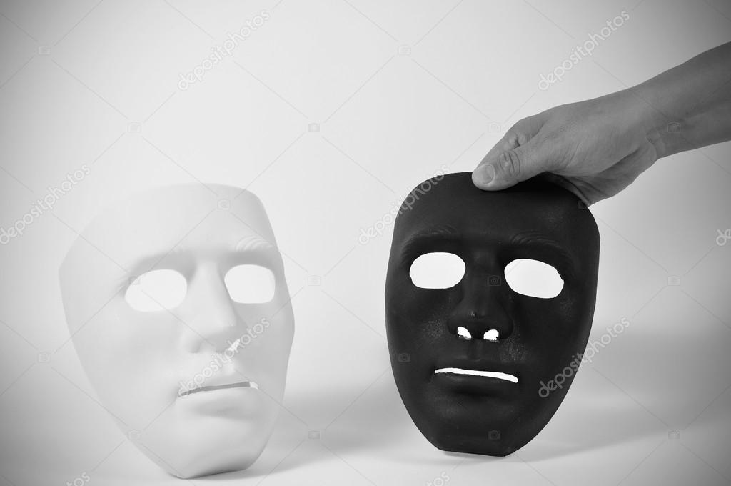 Black and white masks l human behavior Stock Photo by ©ekarina